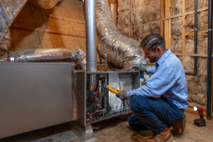 Heating - Bill Howe Emergency HVAC Repair being completed by Bill Howe employee